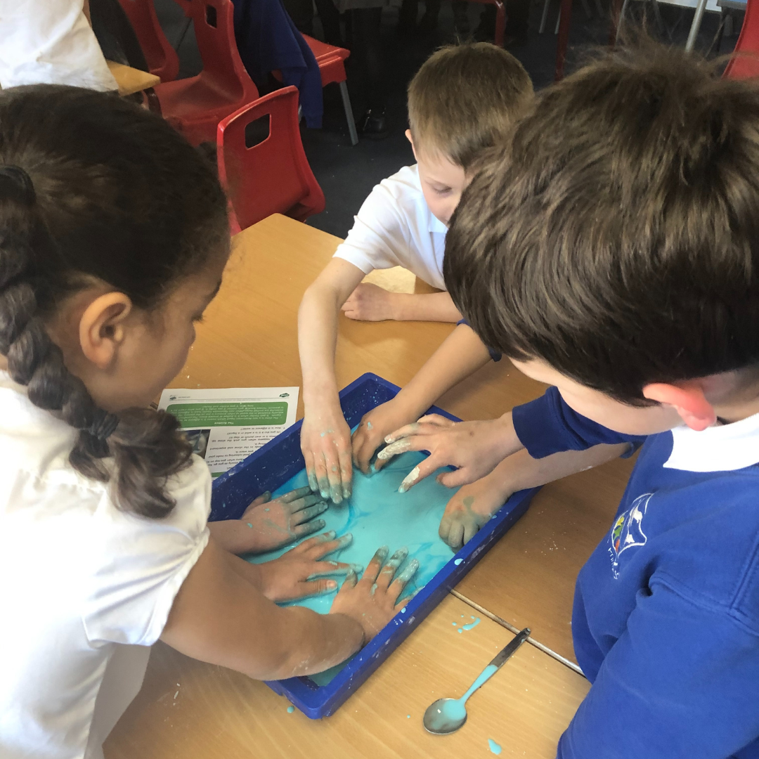 pupils experimenting in science